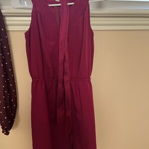 3 Dresses with various brands. Sizing xs, and two 0P. Dresses are AS IS.